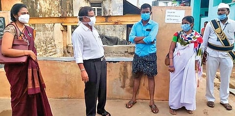 Kurnool DM&HO Dr Rama Giddaiah observing the situation in Vempemta village on Sunday where one girl died due to diarrhoea. (Photo | Express)