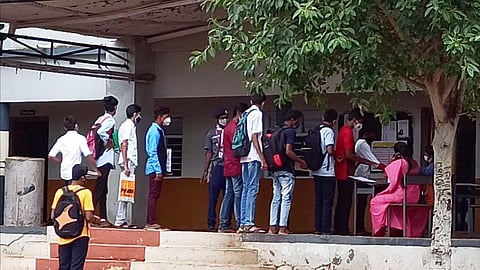 Asha workers screening SSLC students at the examination center in Bagalkot. (Photo | EPS)
