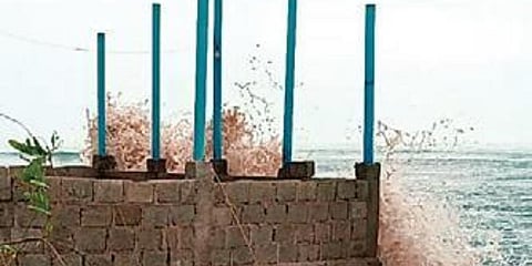 Locals said tides around 20 feet high have caused sea water to engulf the entire beach and damage houses. (Photo | Express)