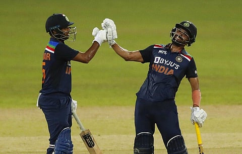 India's Deepak Chahar, right, and Bhuvneshwar Kumar cheer each others after scoring a boundary against Sri Lanka. (Photo | AP)