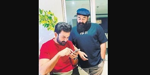 Mollywood actors Mohanlal (R) and Prithviraj Sukumaran