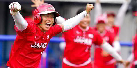 Japan's Eri Yamada celebrates their win over Mexico during their softball game at the 2020 Summer Olympics, Thursday, July 22, 2021, in Fukushima , Japan. (Photo | AP)