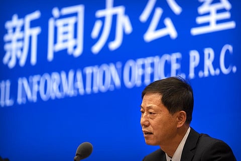 Yuan Zhiming, director of the Wuhan National Biosafety Laboratory of the Wuhan Institute of Virology, speaks at a press conference at the State Council Information Office in Beijing. (Photo | AP)