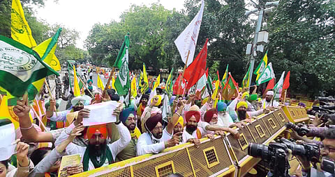 Farmers shouting slogans during their protest against three farm laws amid monsoon session of Parliament at jantar mantar in New Delhi. (Photo | Shekhar Yadav, EPS)
