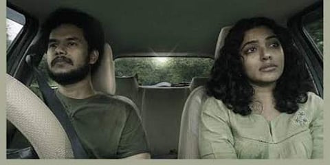 Jitin Puthanchery (L) and Rima Kallingal in 'Santhoshathinte Onnam Rahasyam'. (Photo| Twitter)