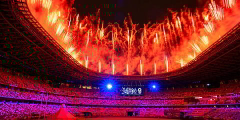Fireworks illuminate over National Stadium during the opening ceremony of 2020 Tokyo Olympics. (Photo | AP)