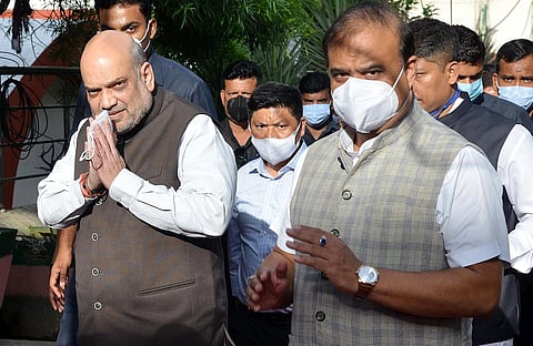 Union Home Minister Amit Shah with Assam Chief Minister Himanta Biswa Sarma in Guwahati, Sunday, July 25, 2021. (Photo | ANI)