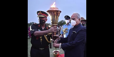 Tamil Nadu Governor Banwarilal Purohit receiving the Flame from Lt. General A Arun. (Photo | P Jawahar, EPS)