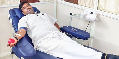 Mochi Chandrasekhar donating blood  at  a hospital in Anantapur. (Photo | Express)