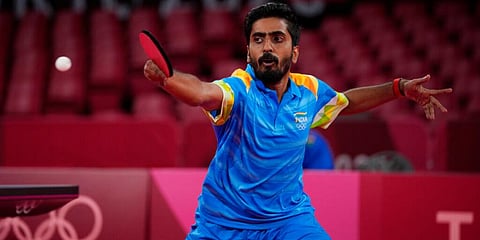 Sathiyan Gnanasekaran of India competes during the table tennis men's singles second round match against Lam Siu Hang of Hong Kong at the 2020 Summer Olympics in Tokyo. (Photo | AP)