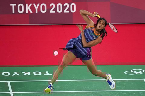 India's Pusarla V. Sindhu competes against Israel's Ksenia Polikarpova during their women's singles badminton match at the 2020 Summer Olympics. (Photo | AP)