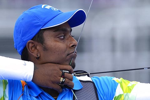 India's Atanu Das prepares to shoot during the men's team competition at the 2020 Summer Olympics. (Photo | AP)