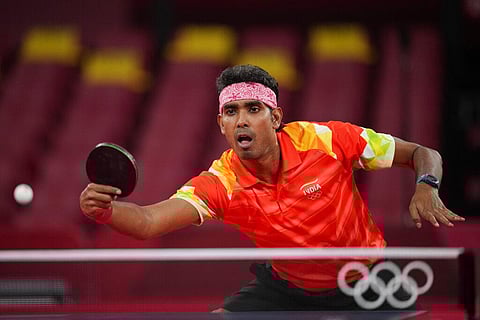 India's Kamal Achanta competes during the table tennis men's singles second round match against Portugal's Tiago Apolonia at the 2020 Summer Olympics. (Photo | AP)