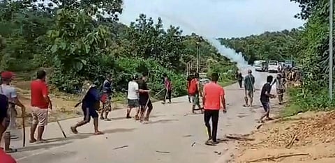 Locals during a clash with police personnel at Assam-Mizoram border at Lailapur in Cachar district, Monday. (Photo | PTI)