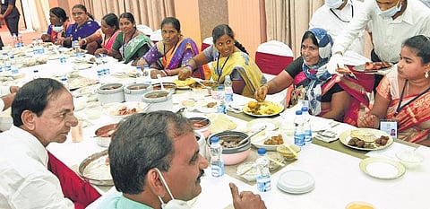 Chief Minister K Chandrasekhar Rao has lunch with villagers from Huzurabad after an interactive session on the Dalit Bandhu scheme, at Pragathi Bhavan. (Photo | Express)