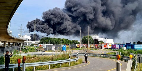 A dark cloud of smoke rises above the chemical park in Leverkusen, Germany. (Photo| AP)