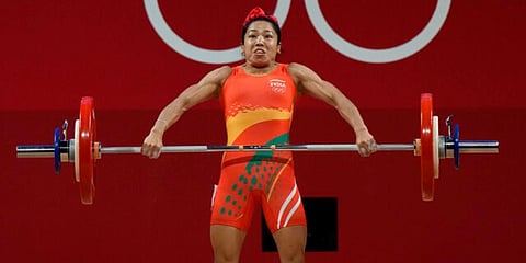 Mirabai Chanu Saikhom of India competes in the women's 49kg weightlifting event, at the 2020 Summer Olympics in Tokyo, Japan. (Photo | AP)
