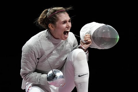Sofia Pozdniakova celebrates after the gold at the women's individual Sabre final competition at the 2020 Summer Olympics. (Photo | AP)