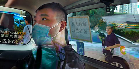 Former waiter Tong Ying-kit arrives at a court in a police van in Hong Kong. (File photo| AP)