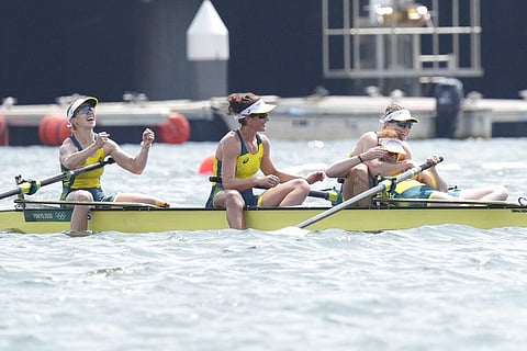 Lucy Stephan, Rosemary Popa, Jessica Morrison and Annabelle McIntyre of Australia celebrate after winning the gold medals in the women's rowing four final. (Photo | AP)