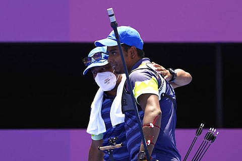 India's Atanu Das, right, celebrates after winning his individual eliminations match against South Korea's Oh Jinhyek at the 2020 Summer Olympics. (Photo | AP)