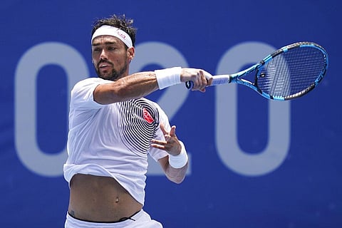 Fabio Fognini, of Italy, returns to Daniil Medvedev, of the Russian Olympic Committee, during the third round of the men's tennis competition. (Photo | AP)