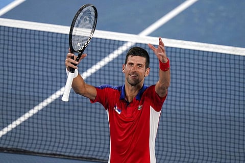Novak Djokovic, of Serbia, celebrates after defeating Kei Nishikori, of Japan, during the quarterfinals of the tennis competition at the 2020 Summer Olympics. (Photo | AP)