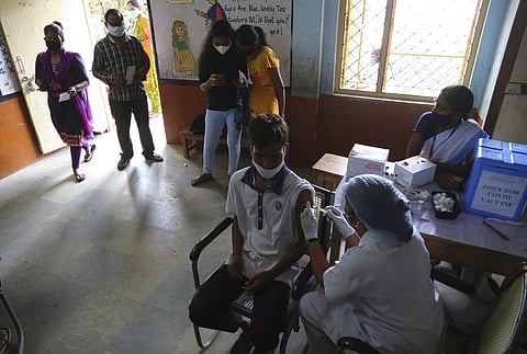 A health worker administers the Covaxin COVID-19 vaccine during a special vaccination drive in Hyderabad. (Photo | AP)