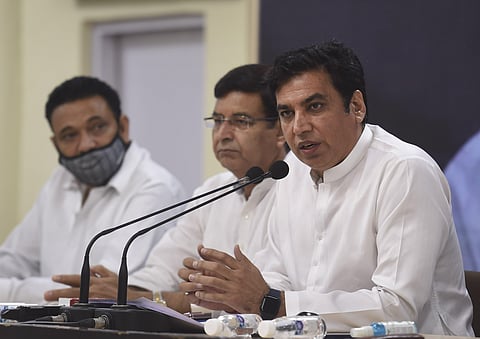 INC in-charge Uttarakhand Devendra Yadav, Uttarakhand PCC chief Pritam Singh (c) addresses a press conference in New Delhi, July 3, 2021. (Photo | PTI)