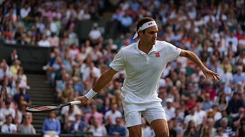 Switzerland's Roger Federer plays a return to Richard Gasquet of France during the men's singles second round match on day four of the Wimbledon. (Photo | AP)