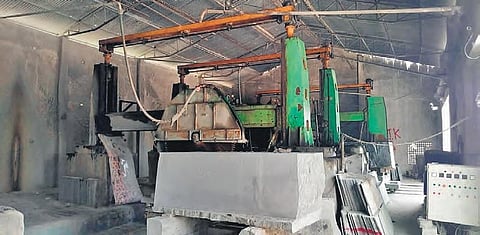 Machines at a granite factory lie idle in the absence of workers since the lockdown