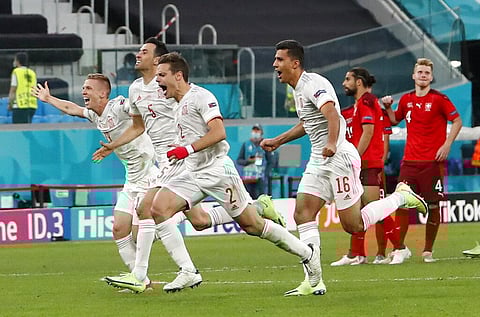Spain players celebrate after the Euro 2020 soccer championship quarterfinal match between Switzerland and Spain, at the Saint Petersburg stadium. (Photo | AP)