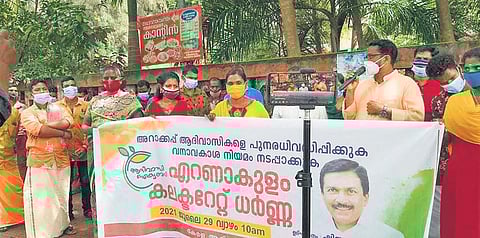 Demanding rehabilitation, tribal families from Arakappu colony stage  protest in front of Ernakulam collectorate on Thursday | EXPRESS