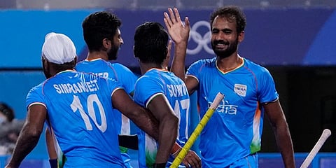 India's Gurjant Singh (9) celebrates after scoring against Japan during a men's field hockey match at the 2020 Summer Olympics in Tokyo, Japan. (Photo | AP)
