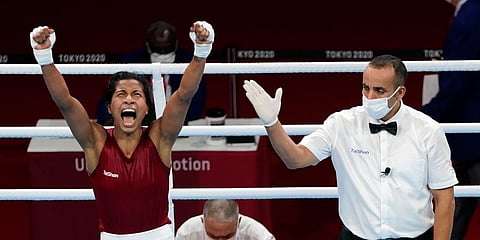 India's Lovlina Borgohain reacts after her victory over Nien-Chin Chen, of Chinese Taipei in their women's welter weight 69kg quarters boxing match at the 2020 Summer Olympics in Tokyo. (Photo | AP)