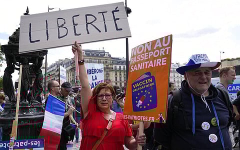 Demonstrators gathered in several cities in France to protest against the COVID-19 pass. (Photo | AP)
