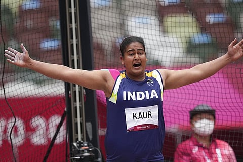Kamalpreet Kaur, of India, reacts after her thrown during the qualification round of the women's discus throw at the 2020 Summer Olympics. (Photo | AP)