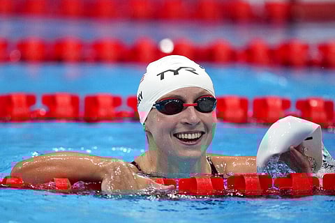 Katie Ledecky, of the United States, reacts after winning a heat of the women's 800-meter freestyle at the 2020 Summer Olympics. (Photo | AP)