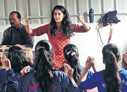 teaching students at Saksham Baal Vikas  Sansthan, Gurgaon