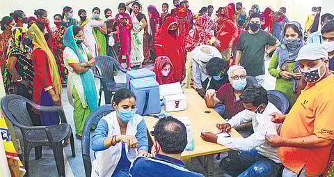 A beneficiary being administered Covid-19 vaccine in Gurugram on Sunday | pti