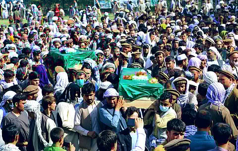Afghans carry the body of civilians killed during fighting between the Taliban and Security forces, during their funeral, in Badakhshan province, northern Afghanistan, July 4, 2021. (Photo | AP)