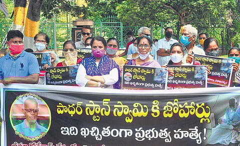 Human Rights activists and Left party leaders pay homage to Fr Stan Swamy in Visakhapatnam. (Photo | G Satyanarayana, EPS)