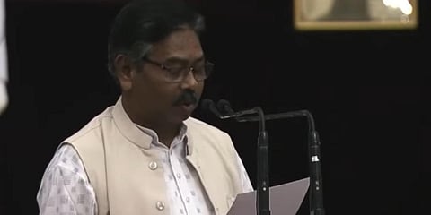 Bishweshwar Tudu taking oath as Minister of State for Tribal Affairs and Jal Shakti on Wednesday. (Photo | YouTube screengrab)