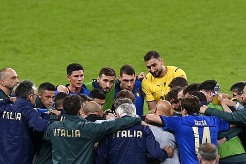 Italy players listen to Italy's manager Roberto Mancini before extra time during the Euro 2020 soccer championship semifinal match between Italy and Spain. (Photo | AP)