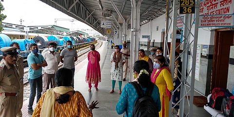 Railway cops, some in civilian clothes, and representatives of child organisations, who were involved in rescuing children seen at a railway station in Bengaluru Division. (Photo | EPS)