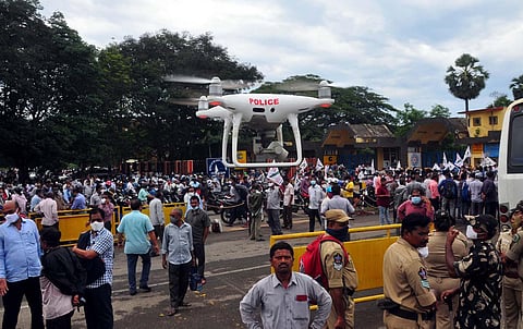 Police carry out drone surveillance at the dharna held at Steal Plant main gate in Visakhapatnam on Thursday (Photo | G Satyanarayana, EPS)