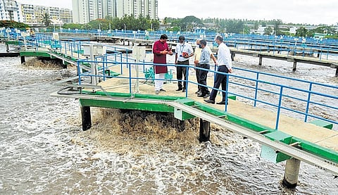 Minister for Environment and Tourism C P Yogeeshwara inspects the Vrishabhavathi valley STP at Nayandahalli and Byramangala Lake on Thursday | Express