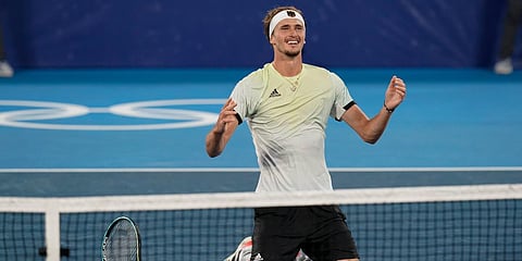 Alexander Zverev reacts after winning the men's single gold medal match of the tennis competition against Karen Khachanov at the 2020 Olympics. (Photo| AP)