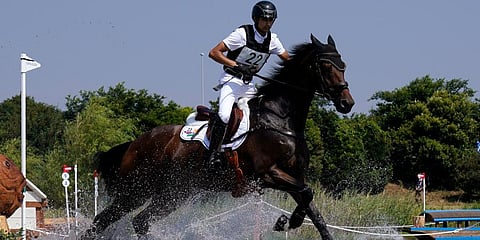 India's Fouaad Mirza, riding Seigneur, during the equestrian eventing cross county competition at the Sea Forest Cross-Country Course in Tokyo at the 2020 Summer Olympics in Tokyo, Japan. (Photo | AP)