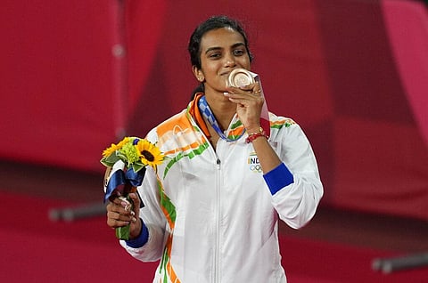 Bronze medalist Pusarla V. Sindhu celebrates during the medal ceremony for women's singles Badminton match at the 2020 Summer Olympics, Sunday, Aug. 1 (Photo | AP)